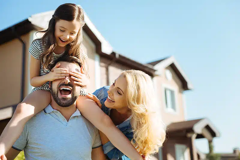 Family enjoying a sunny day outdoors.