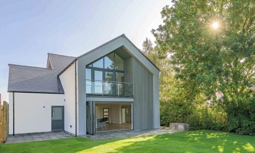 The back garden of a modern house with ecorend rendering