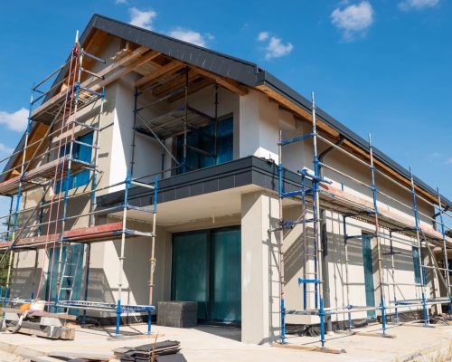 A modern property under construction with EWI