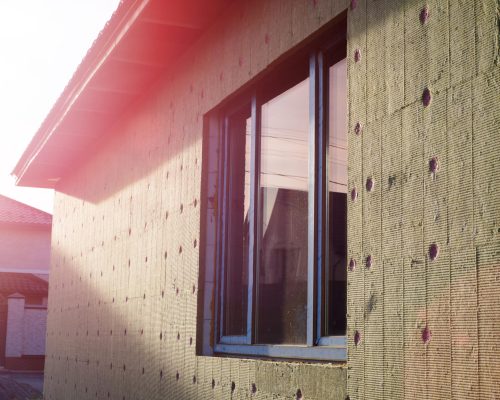 External wall insulation being applied to a house